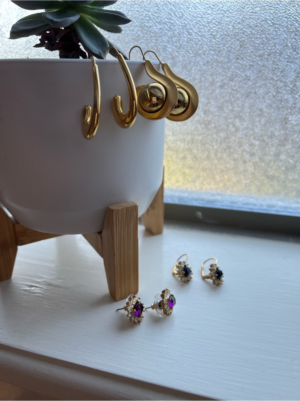 Gold toned earrings - set of 4